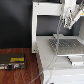 Máquina de dispensación del pegamento automático de escritorio dual del líquido XYZ-3/AB neumático que dispensa Robat